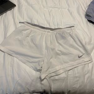 white nike shorts